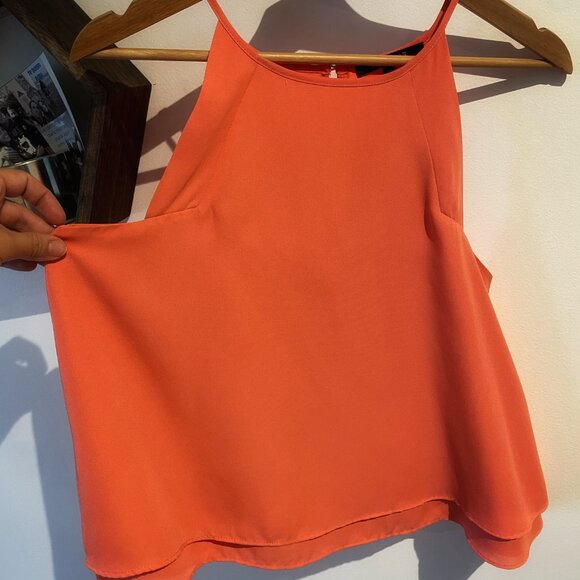 Short orange strapless blouse with a beautiful drape. - Picture 2 of 3
